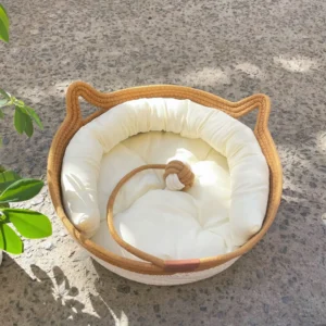 Cama para gato tejida redonda con cojín suave